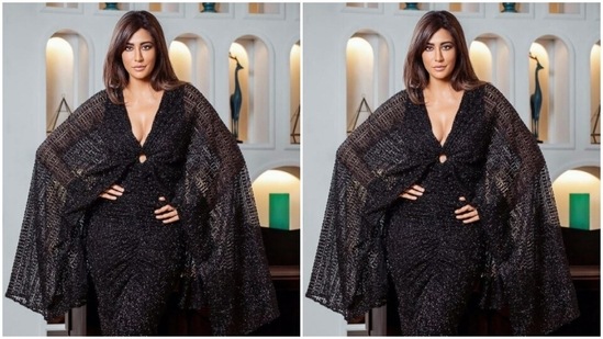 Chitrangda's black shimmery gown featured bodycon details till the ankles. It added more sass to her look with a dramatic cape around her shoulders with a plunging neckline.(Instagram/@chitrangda)