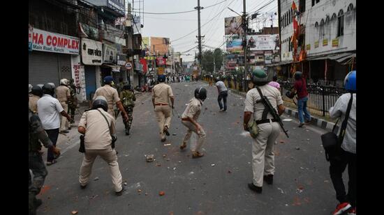 Security personnel clash with protesters in Ranchi on Friday. (PTI)