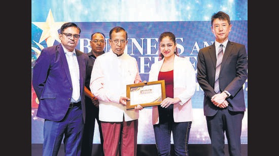 Natasha Singla for Elsa Design Co.: FURNITURE AND INTERIOR BRAND OF THE REGION: Natasha Singla receiving the certificate from Union minister of state for commerce and industry Som Parkash. Natasha Singla for Elsa Design Co.: FURNITURE AND INTERIOR BRAND OF THE REGION: Natasha Singla receiving the certificate from Union minister of state for commerce and industry Som Parkash.