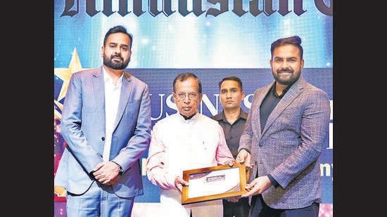 Detailing Bull: AUTOMOTIVE DETAILING BRAND OF THE YEAR: Union minister of state for commerce and industry Som Parkash felicitating Saran Virdi and Ved Pratap (right). Detailing Bull: AUTOMOTIVE DETAILING BRAND OF THE YEAR: Union minister of state for commerce and industry Som Parkash felicitating Saran Virdi and Ved Pratap (right).