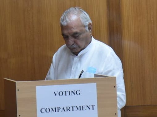 Haryana former CM Bhupinder Singh Hooda cast his vote for Rajya sabha election at Haryana Assembly Chandigarh. Haryana former CM Bhupinder Singh Hooda cast his vote for Rajya sabha election at Haryana Assembly Chandigarh.