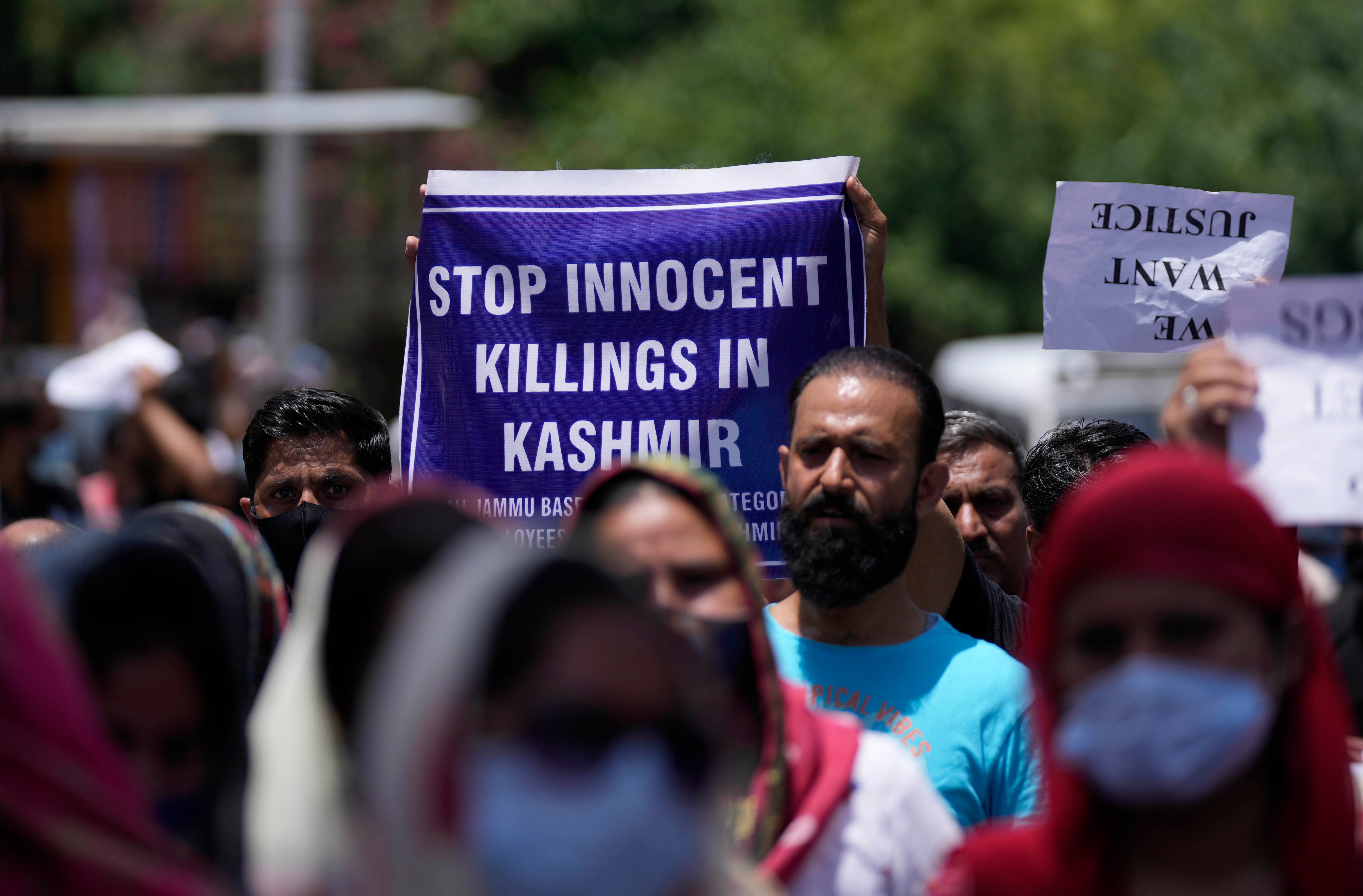 Employees of Jammu and Kashmir Teachers Association march in a protest against the killing of colleague Rajini Bala in Jammu, on June 2, 2022.&nbsp; (AP)