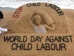 Puri: Artist Sudarsan Patnaik gives finishing touches to a sand sculpture with a message, Stop Child Labour, ahead of World Day against Child Labour, in Puri, Thursday, June 11, 2020. (PTI Photo)(PTI11-06-2020_000162A) (PTI) Puri: Artist Sudarsan Patnaik gives finishing touches to a sand sculpture with a message, Stop Child Labour, ahead of World Day against Child Labour, in Puri, Thursday, June 11, 2020. (PTI Photo)(PTI11-06-2020_000162A) (PTI)