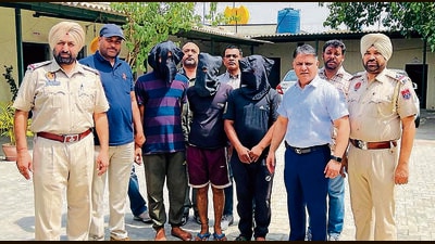 With the arrests, police also claimed to have solved at least 11 cases of snatching, burglaries and robbery. A.32- bore pistol with 13 cartridges, a .315 bore country-made pistol with two cartridges, two snatched bikes, five mobiles, ₹50,000 and 2.6kg of a narcotic powder was recovered from their possession. (Harvinder Singh/HT) With the arrests, police also claimed to have solved at least 11 cases of snatching, burglaries and robbery. A.32- bore pistol with 13 cartridges, a .315 bore country-made pistol with two cartridges, two snatched bikes, five mobiles, ₹50,000 and 2.6kg of a narcotic powder was recovered from their possession. (Harvinder Singh/HT)
