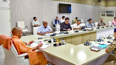 Uttar Pradesh chief minister Yogi Adityanath holding a meeting to review the law and order situation. (PTI PHOTO) Uttar Pradesh chief minister Yogi Adityanath holding a meeting to review the law and order situation. (PTI PHOTO)