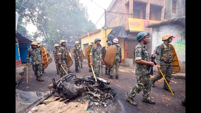 Security personnel deployed after violence during protest over controversial remarks made by two now-suspended BJP leaders about Prophet Mohammed, in Howrah district on Saturday. (PTI) Security personnel deployed after violence during protest over controversial remarks made by two now-suspended BJP leaders about Prophet Mohammed, in Howrah district on Saturday. (PTI)