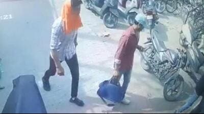 The robbers had fled after firing two shots at a vegetable vendor, who had managed to grab one of them. (HT) The robbers had fled after firing two shots at a vegetable vendor, who had managed to grab one of them. (HT)