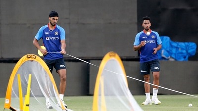 India's Arshdeep Singh (L) and Umran Malik India's Arshdeep Singh (L) and Umran Malik