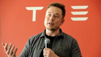 Larry Ellison, a friend of Tesla Chief Executive Officer Elon Musk, will not stand for re-election to Tesla's board when his term ends. (REUTERS)