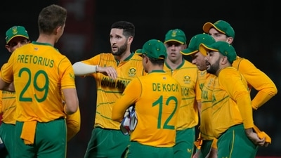 South Africa's Wayne Parnell, center without cap, celebrates with teammates the dismissal of India's Ruturaj Gaikwad during the first Twenty20 cricket match between India and South Africa in New Delhi. (AP) South Africa's Wayne Parnell, center without cap, celebrates with teammates the dismissal of India's Ruturaj Gaikwad during the first Twenty20 cricket match between India and South Africa in New Delhi. (AP)