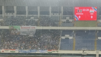 Fans with ‘remove ATK and give us Mohun Bagan back’ posters in Saltlake Stadium (HT)