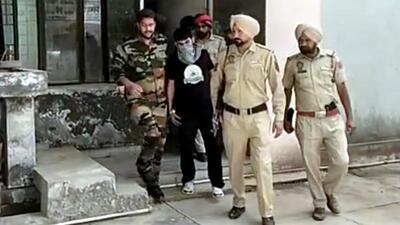 Accused Sandeep Singh alias Kekda being produced in Mansa court on Saturday from where he was sent to three-day police remand. (Sanjeev Kumar/HT) Accused Sandeep Singh alias Kekda being produced in Mansa court on Saturday from where he was sent to three-day police remand. (Sanjeev Kumar/HT)