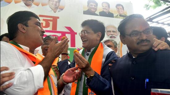 Winning candidates Piyush Goyal (C), Anil Bonde (R) and Dhananjay Mahadik (L) celebrate after the results of Rajya Sabha elections, outside BJP office in Mumbai,&nbsp;(Anshuman Poyrekar/HT PHOTO)