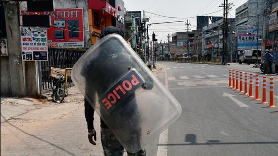 Paramilitary personnel stand guard during the curfew imposed after a protest against suspended BJP leader Nupur Sharma and expelled party leader Naveen Jindal over their alleged remarks on Prophet Muhammad, in Ranchi on Saturday. (ANI)