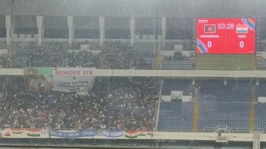 Fans with ‘remove ATK and give us Mohun Bagan back’ posters in Saltlake Stadium(HT)