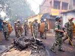 Security personnel deployed after violence during protest over controversial remarks made by two now-suspended BJP leaders about Prophet Mohammed, in Howrah district on Saturday. (PTI)