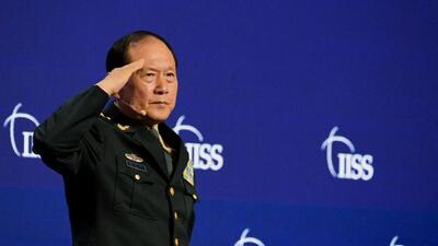 China’s state councilor and defence minister General Wei Fenghe salutes after his plenary session during the 19th Shangri-La Dialogue in Singapore, on Sunday. (REUTERS) China’s state councilor and defence minister General Wei Fenghe salutes after his plenary session during the 19th Shangri-La Dialogue in Singapore, on Sunday. (REUTERS)