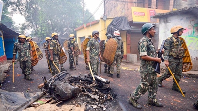 Security personnel deployed after violence during protest over controversial remarks made by two now-suspended BJP leaders about Prophet Mohammed, in Howrah district on Saturday. (PTI) (HT_PRINT)