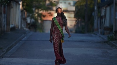 Transgender model Eloa Rodrigues, 29, poses for pictures for AFP in the street outside her house in Rio de Janeiro, Brazil, (AFP) Transgender model Eloa Rodrigues, 29, poses for pictures for AFP in the street outside her house in Rio de Janeiro, Brazil, (AFP)