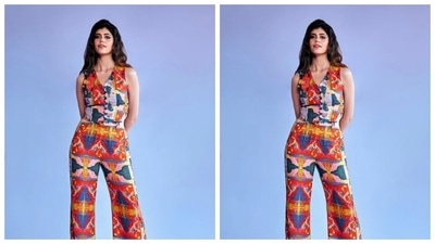 Sanjana paired a sleeveless multicoloured cropped top with a plunging neckline, with a pair of pair of trousers of the same print. “Cool off that heat wave fam,” she captioned her pictures. (Instagram/@sanjanasanghi96)