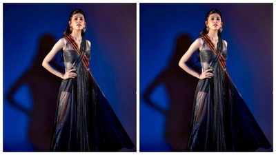 Sanjana paired a black off-shoulder bra with gathered-up details in the middle with a black pair of shorts. She teamed it with a tulle gown with translucent features. The gown also came with orange and blue borders near to the neck. (Instagram/@sanjanasanghi96)