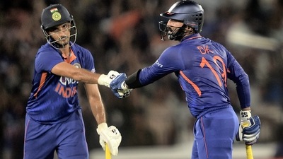 Indian batsmen Dinesh Karthik and Harshal Patel during the 2nd T20 cricket match between India and South Africa, at Barabati stadium in Cuttack (PTI)