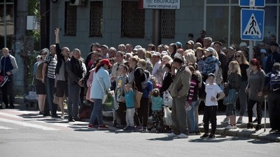 Local residents on the street in Kherson, amid the ongoing Russian military action in Ukraine. (AFP) Local residents on the street in Kherson, amid the ongoing Russian military action in Ukraine. (AFP)