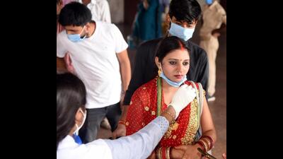 A health worker collects swab sample for Covid-19 test in Patna on Sunday. (Santosh Kumar/HT Photo) A health worker collects swab sample for Covid-19 test in Patna on Sunday. (Santosh Kumar/HT Photo)