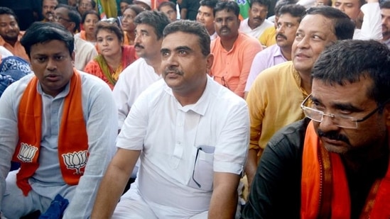 West Bengal BJP chief Sukanta Majumdar, Suvendu Adhikari and party supporters stage a dharna over the protests after Friday prayers in wake of Nupur Sharma's remarks on Prophet Muhammad, in Kolkata on Sunday.&nbsp;(ANI)