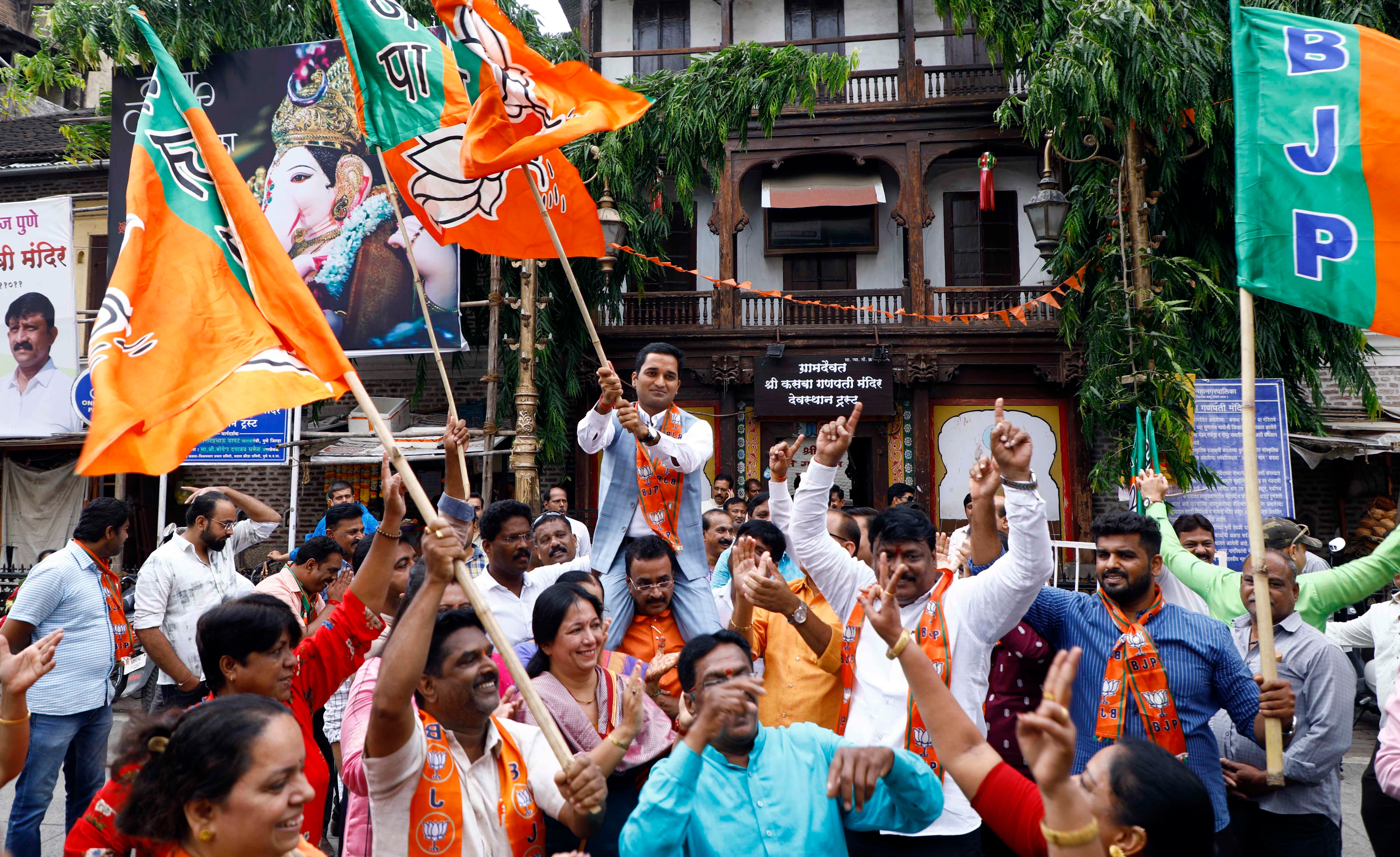 BJP party workers and supporters celebrate the success achieved in the Rajya Sabha at Kasba peth in on Sunday. (Rahul Raut/HT Photo) BJP party workers and supporters celebrate the success achieved in the Rajya Sabha at Kasba peth in on Sunday. (Rahul Raut/HT Photo)