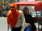A rickshaw puller covers his face from the heatwave as temperature touches 44 degrees, in New Delhi. (ANI Photo) A rickshaw puller covers his face from the heatwave as temperature touches 44 degrees, in New Delhi. (ANI Photo)