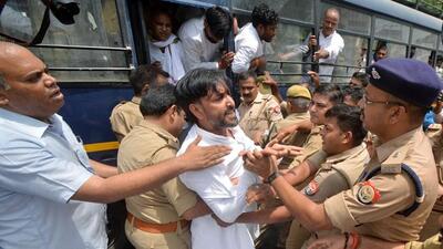 Congress supporters during their protest in Lucknow. (ANI PHOTO)