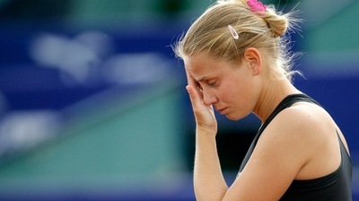 Tennis player Jelena Dokic, representing Australia, reacts during a match against France's Karla Mraz, in Bucharest, Romania (AP) Tennis player Jelena Dokic, representing Australia, reacts during a match against France's Karla Mraz, in Bucharest, Romania (AP)