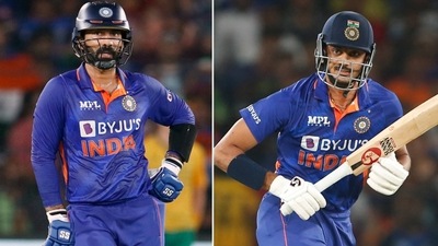 Dinesh Karthik (L) and Axar Patel (ANI)