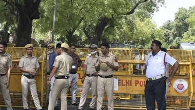 New Delhi: Police personnel stand guard near ED office, during summoning of Congress leader Rahul Gandhi in the National Herald case, in New Delhi, Monday, June 13, 2022. (PTI) New Delhi: Police personnel stand guard near ED office, during summoning of Congress leader Rahul Gandhi in the National Herald case, in New Delhi, Monday, June 13, 2022. (PTI)