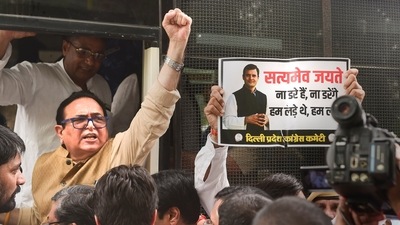 Congress activists being detained during a protest against summoning of party leader Rahul Gandhi in the National Herald case, near AICC office in New Delhi, Monday, (PTI) Congress activists being detained during a protest against summoning of party leader Rahul Gandhi in the National Herald case, near AICC office in New Delhi, Monday, (PTI)