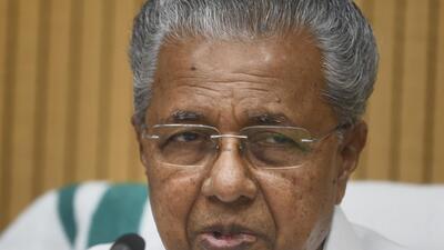 Two Youth Congress workers on Monday boarded a passenger plane at Kannur airport in which Kerala chief minister Pinarayi Vijayan was travelling to Thiruvananthapuram and showed him black flags to protest alleged police repression (PTI) Two Youth Congress workers on Monday boarded a passenger plane at Kannur airport in which Kerala chief minister Pinarayi Vijayan was travelling to Thiruvananthapuram and showed him black flags to protest alleged police repression (PTI)
