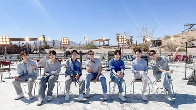 BTS members Jin, Jungkook, V, RM, Suga, Jimin, and J-Hope performed Proof Live.