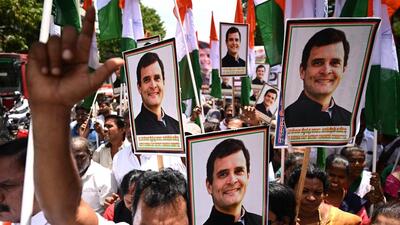 Congress supporters protesting ED’s summon to Rahul Gandhi. (AFP)