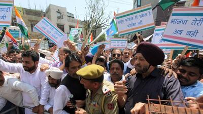 Congress leaders and workers, including Jammu and Kashmir Pradesh Congress Committee (JKPCC) president GA Mir, were detained Monday after they staged a sit-in and tried to take out a march to protest alleged misuse of government agencies against opposition leaders by the BJP-led central government. (Abhishek Baru)