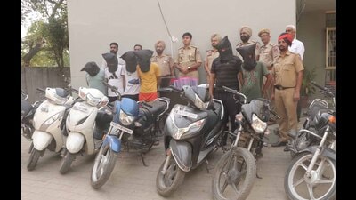 The accused and the vehicles recovered from them in police custody on Monday. (HT Photo)