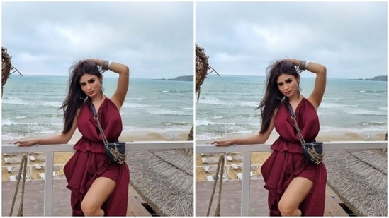 Mouni's fashion diaries are drool-worthy. A few days back, Mouni shared a set of pictures of herself looking super stylish in a wine-red gown with a thigh high slit.(Instagram/@imouniroy)