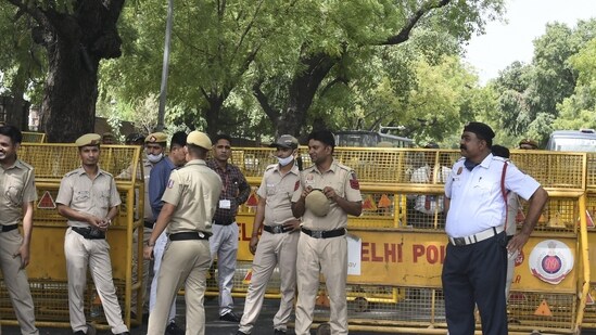 New Delhi: Police personnel stand guard near ED office, during summoning of Congress leader Rahul Gandhi in the National Herald case, in New Delhi, Monday, June 13, 2022.&nbsp;(PTI)