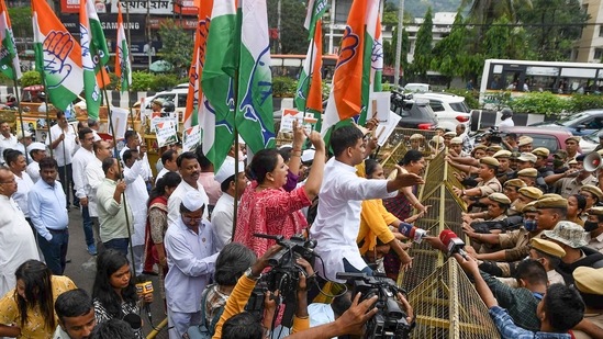 Congress workers stage a protest over summoning of party leader Rahul Gandhi in the National Herald case by ED, in Guwahati.(PTI)