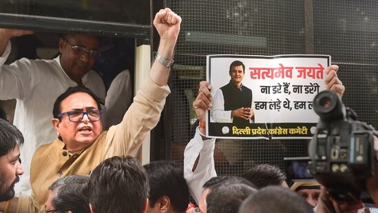 Congress activists being detained during a protest against summoning of party leader Rahul Gandhi in the National Herald case, near AICC office in New Delhi, Monday,(PTI)