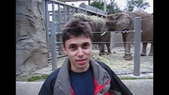 The image, taken from the first-ever video uploaded on YouTube, shows Jawed Karim doing a vlog in front of an elephant enclosure at the San Diego Zoo.(YouTube/@jawed)