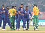 India's captain Rishabh Pant, third right and teammates walk back after winning the third Twenty20(AP)