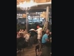 The image, taken from the video posted on Reddit, shows a chef twirling the dough.(Reddit/@Anointed-Knight) The image, taken from the video posted on Reddit, shows a chef twirling the dough.(Reddit/@Anointed-Knight)