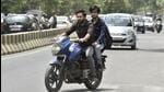 Noida, India- June 14, 2022: Commuters driving without helmet, According to data from the traffic police, driving without helmet, unauthorised parking and driving on the wrong side are among the top traffic offences in Gautam Budh Nagar. In just the first five months, traffic police have issued over two lakh challans , in Noida, India, on Tuesday, June 14, 2022. (Photo by Sunil Ghosh / Hindustan Times) To go with Snehil’s story Noida, India- June 14, 2022: Commuters driving without helmet, According to data from the traffic police, driving without helmet, unauthorised parking and driving on the wrong side are among the top traffic offences in Gautam Budh Nagar. In just the first five months, traffic police have issued over two lakh challans , in Noida, India, on Tuesday, June 14, 2022. (Photo by Sunil Ghosh / Hindustan Times) To go with Snehil’s story