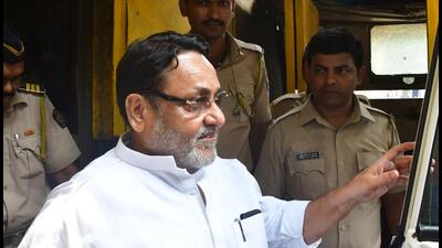 Nationalist Congress Party leader Nawab Malik Bhushan Koyande/HT Photo